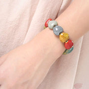  Close-up of the Colorful 'His Steadfast Love' Ceramic Heart bead Bracelet worn on another Model's wrist