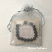 image of ‘Thou Art With Me’ product package in it's standard packaging- Gray organza bag