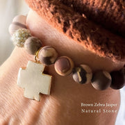 November's small batch bracelet of the month. Give thanks with a grateful heart. Brown zebra jasper natural stone bracelet on wrist.