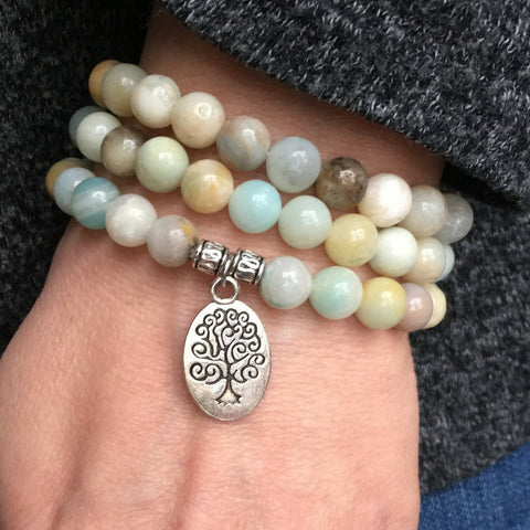 very close-up of the Tree of Life Wrap Amazonite Bead Bracelet on Model&