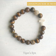product top-view of the Natural Stone ‘Thou Art With Me’ Tiger's Eye with Ivory Cross Bead Bracelet - Orignal style that has a sparkly pave ball - Plus size 8-inch
