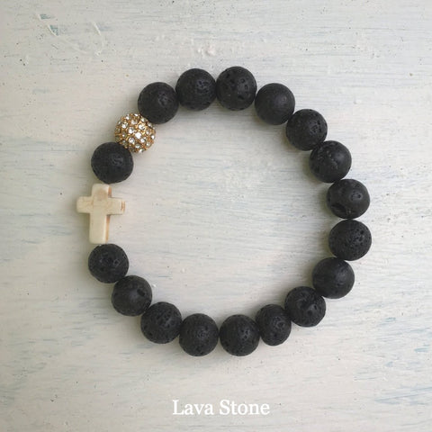 product top-view of the Natural Stone ‘Thou Art With Me’ Lava Stone with Ivory Cross Bead Bracelet - Orignal style that has a sparkly pave ball