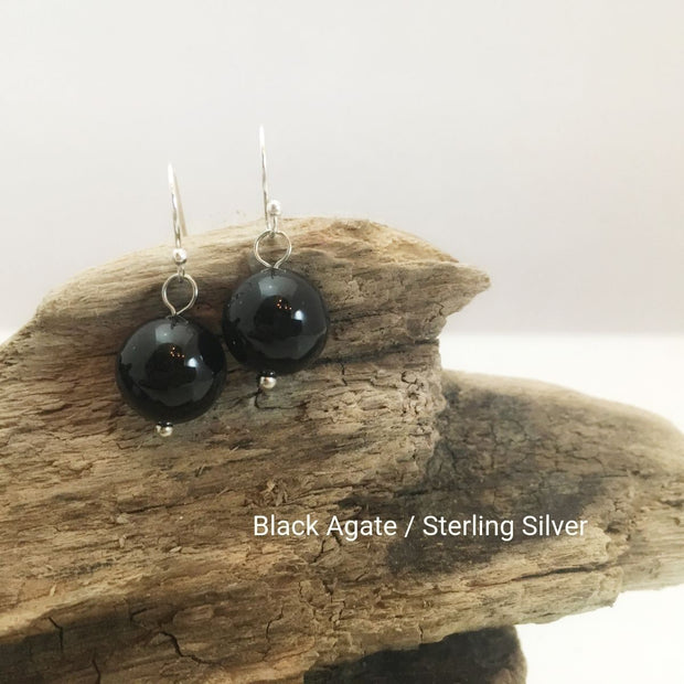 close-up of the Natural Stone Blessing Earrings—Black Agate bead and Sterling Silver Hook
