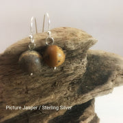 close-up of the Natural Stone Blessing Earrings—Picture Jasper bead and Sterling Silver Hook