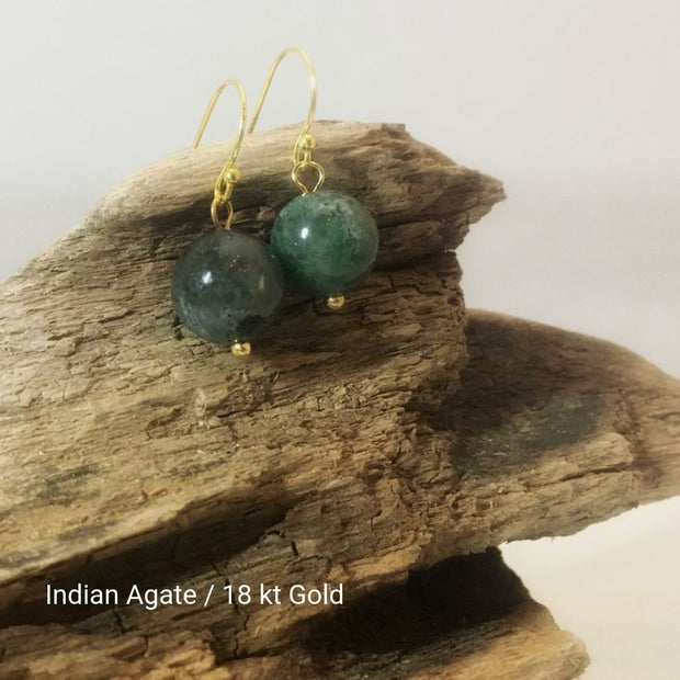 close-up of the Natural Stone Blessing Earrings—Indian Agate bead and Sterling Silver Hook plated in 18k gold