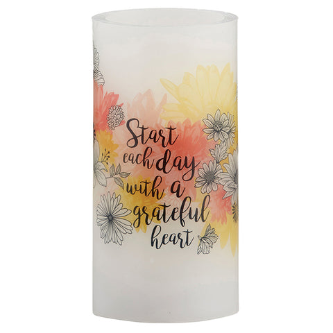 Front view of the LED Candle product with Scripture Verse Start your day with a grateful heart against white background